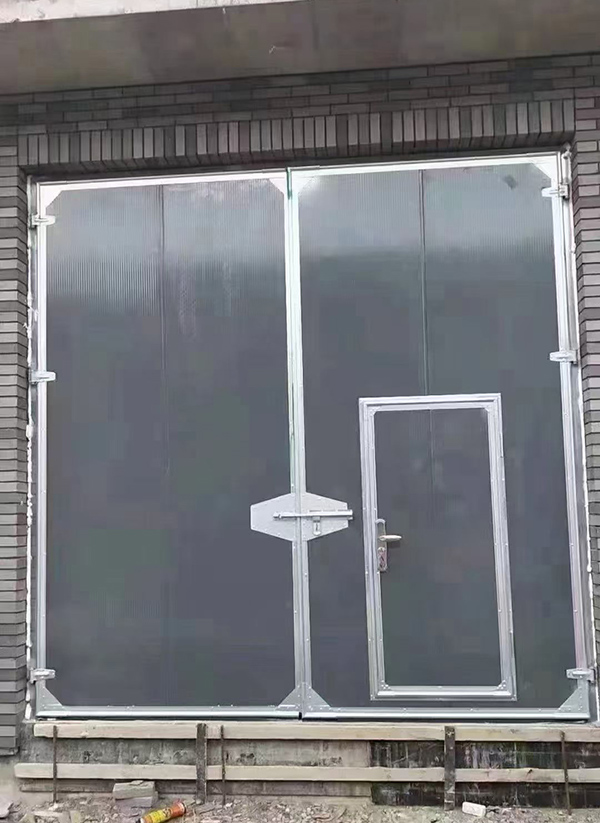 陇县工业平开门在大型设备制造车间的应用实例 陇县工业平开门在大型设备制造车间的应用实例